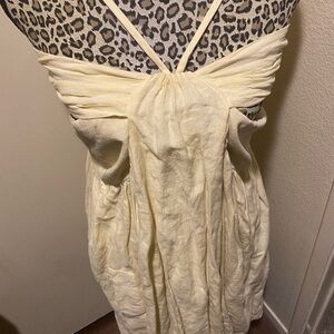 Cute linen dress with long strap that can be tied around neck and into a bow